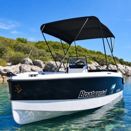 Compass 160 rental boat with sun canopy in a clear turquoise bay – boat rental in Afitos, Chalkidiki